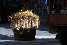 Basket With Garlic And Lemons For Sale In The Island Of Ischia,