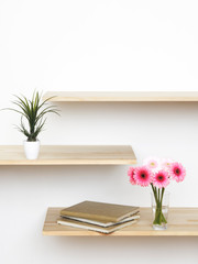 Wall Mural - pink flowers on book shelf