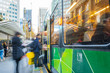 © Gary Chapman/Austockphoto - Commuters rushing to board public transport in city street