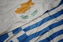 Waving Colorful Flag Of Greece And National Flag Of Cyprus.
