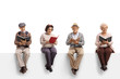 © Ljupco Smokovski - Group of elderly people sitting on a white panel reading books