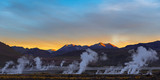 Panoramic photograph of the Tatio geyser field at sunrise, Atacama Desert, Chile.