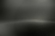 © AITTHIPHONG - Brushed black metal wall with scratched surface, abstract texture background