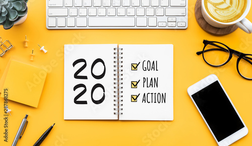 Fotomural 2020 new year goal,plan,action text on notepad with office accessories