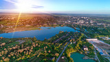Fototapeta Miasto - city at sunset from the drone