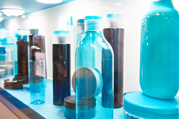 Showcase shop with plastic bottles shampoo