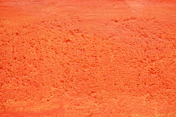 Canvas Print - Orange Painting on Concrete Wall Texture Background.