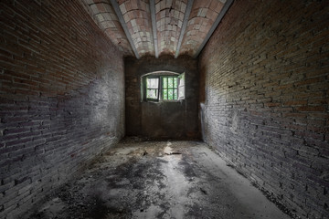 Wall Mural - Empty and dark room of an abandoned house