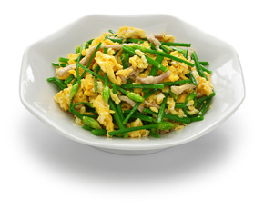 Wall Mural - stir fried flowering garlic chives with eggs, chinese cuisine