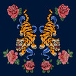 Embroidery patch with oriental tigers and flowers. Vector embroidered floral motif