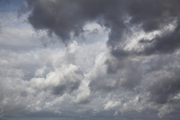 Wall Mural - autumn sky with grey heavy clouds