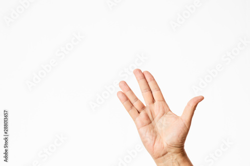 Fotomural male hand waving in a trekkie style isolated in white background