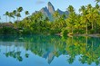 View of the Mont Otemanu mountain reflecting in water at sunset in Bora Bora, French Polynesia, South Pacific