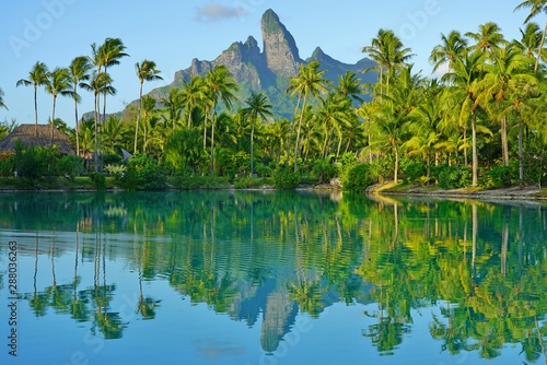 Fotomural View of the Mont Otemanu mountain reflecting in water at sunset in Bora Bora, Fr