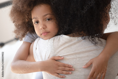 Upset Little Cute Mixed Race Girl Hugging Mom Buy This Stock