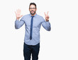 © Krakenimages.com - Young business man wearing glasses over isolated background showing and pointing up with fingers number seven while smiling confident and happy.
