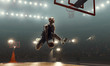 © TandemBranding - African american basketball player in action on a floodlit court. Slam dunk