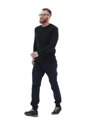 Wall Mural - bearded man in a black sweater, stepping forward .isolated on white