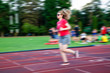 © Melinda Nagy - young woman on running track motion blur