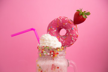 Wall Mural - Delicious dessert strawberry smoothie with pink bagel and cream