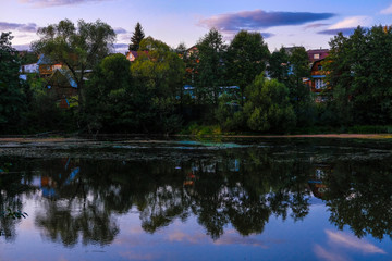 Poster - Landscape with the image of a lake at sunset