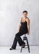 © Freepik - Happy senior lady sitting on a stool