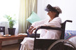 © WavebreakMediaMicro - Senior woman using virtual realty headset at nursing home
