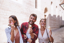 Friends Walking And Eating Ice Cream,have A Fun