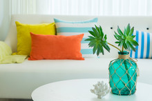 Modern Design Of Living Room With Yellow,blue And Orange Pillow On Sofa. Modern Coastal Home Interior. 