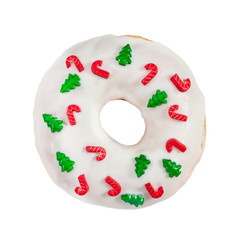 Wall Mural - Christmas donut with white icing and sprinkles isolated on white background.