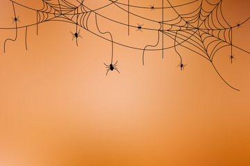 black silhouette group of spider creating net residence at the corner on retro blur orange gradient color background for halloween night party design concept concept	