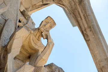 Statue on facade of Sagrada Familia in Barcelona, Spain