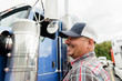 © jamie grill photography/Stocksy - Portrait of truck driver