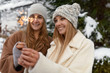 © Milles Studio/Stocksy - Content pretty women with burning sparklers outdoors