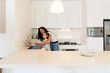 © Bisual Studio/Stocksy - Mother and daughter washing their hands on the kitchen