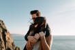 © Caleb Gaskins/Stocksy - Couple embracing each other