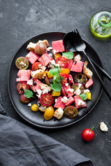 Wall Mural - Watermelon salad with feta, tomatoes cherry and mint