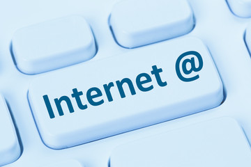 Wall Mural - Internet access online button at sign blue computer keyboard