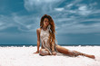 © zolotareva_elina - beautiful young woman in white exotic dress on the beach