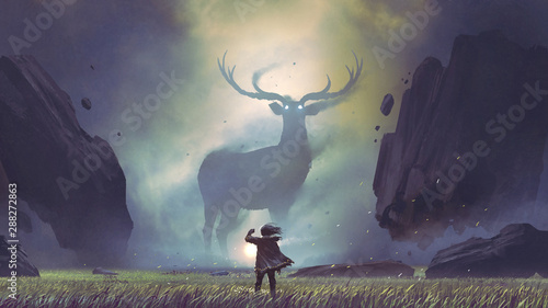 Cuadros en Lienzo the man with a magic lantern facing the giant deer in a mysterious valley, digit
