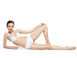 © Valua Vitaly - Beautiful woman with perfect body lying on white