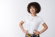 © Cookie Studio - Good-looking curly-haired mixed-race girl hipster stylish outfit hold hands waist confident enthusiastic smiling satisfied self-assured, woman giving lecture feminism women power, white background