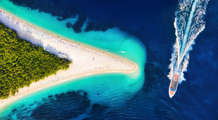 Wall Mural - croatia, hvar island, bol. aerial view at the zlatni rat. aerial view of luxury floating boat on blu