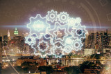Fototapeta  - Double exposure of business theme hologram drawing and city veiw background. Concept of success.
