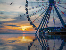 The Ferris Wheel On The Waterfront Of Seattle, Washington In Late Afternoon Light