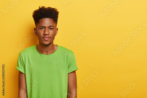 Photo Of Handsome Teenage Boy With Dark Skin Curly