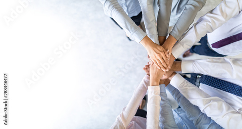 Fotomural Stack of hands. Unity and teamwork concept.