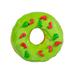 Wall Mural - Christmas donut with green icing and sprinkles isolated on white