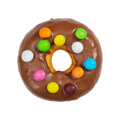 Wall Mural - Chocolate donut with colorful candies isolated on white