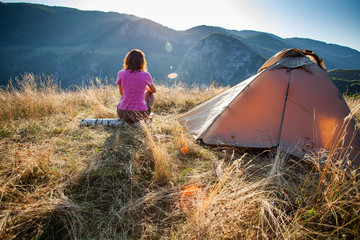 Canvas Print - woman camping with her dog